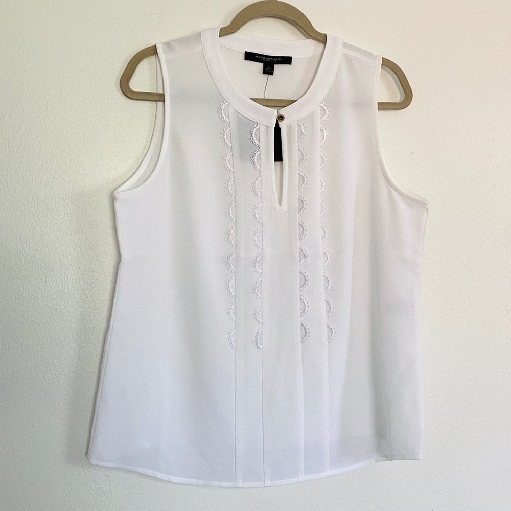 Sleeveless blouses with button